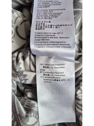 Marc Cain sukienka midi z siateczki w kwiatowy wzór beżowo-czarna N3 |